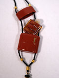 YSL OPIUM PENDANT