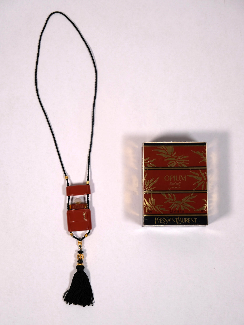 YSL OPIUM PENDANT
